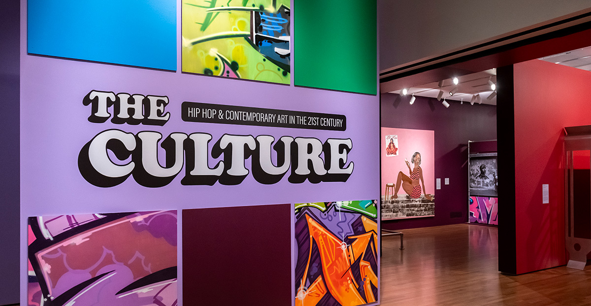 The Culture title wall, featuring six squares. Three of the squares feature colorful graffiti