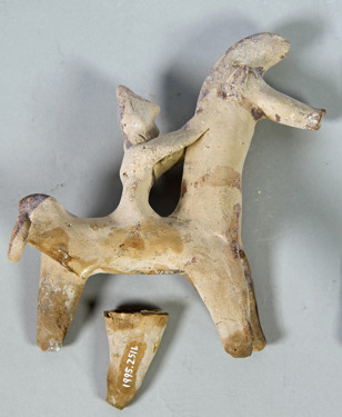 ceramic figurine of a horse and rider