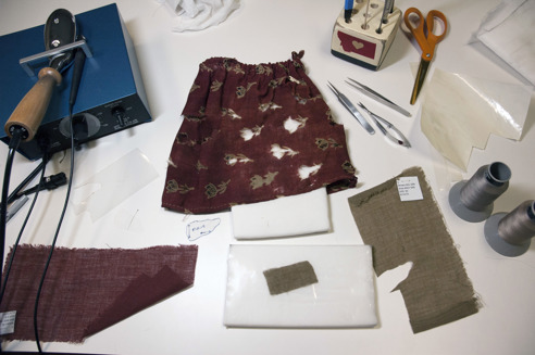 textile conservation of a doll’s clothes