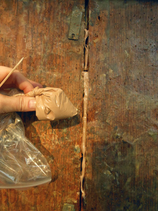 filling cracks in Retablo of Saint Peter