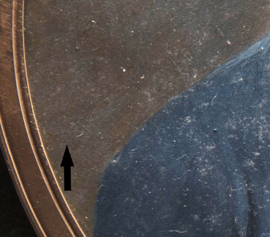 up close detail of the portrail where you can faintly see 1801 inscribed above the man’s right shouder