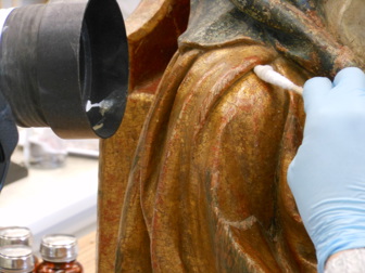sculpture of St. Peter undergoing cleaning