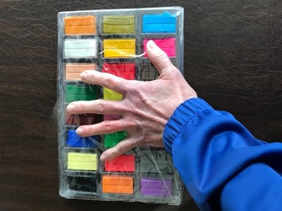 box with various colors of clay
