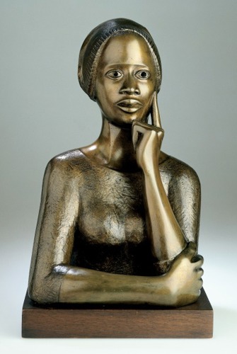 bronze bust of an African woman