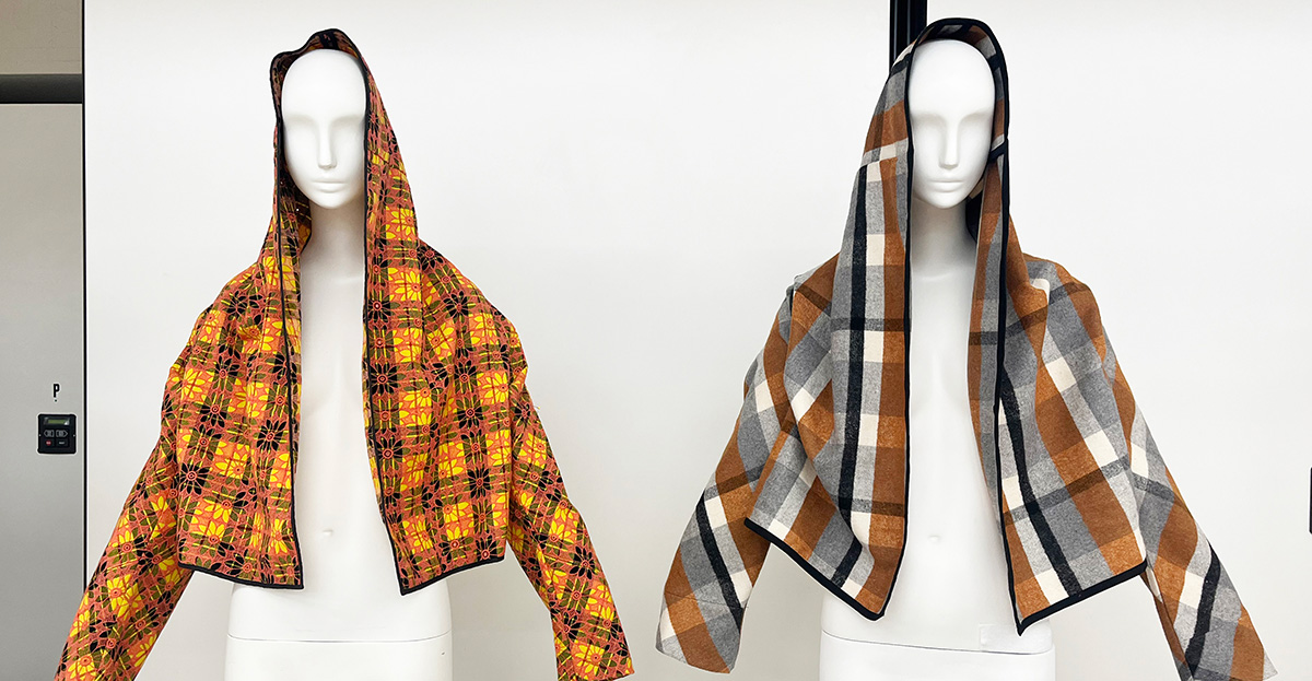 The original Rei Kawakubo jacket (left) and the toile made from a pattern taken from it (right), front views. 