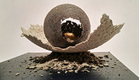 PJ Grimm (b. 1983), Egg Formation 1 Campbell County Recorder series “Golden Age”, 2016, paper pulp (made from the Campbell County Recorder), cement, acrylic & gold leaf on wooden base