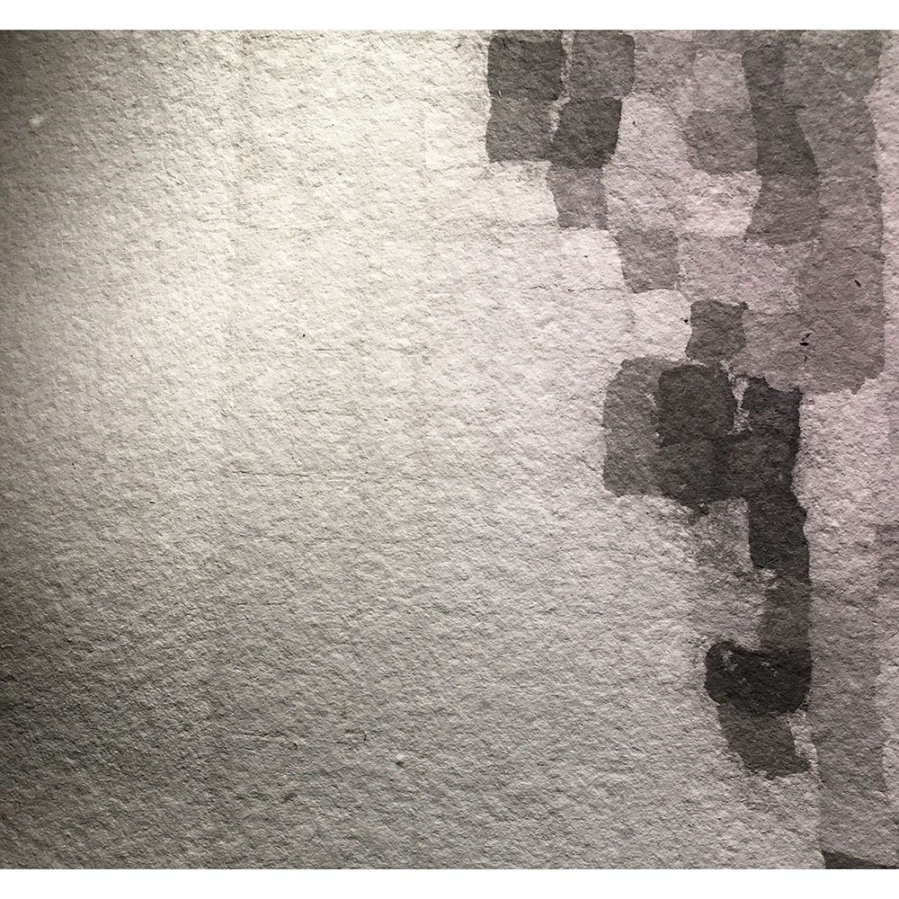 Detail of the pixelated painting, showing the texture and color of the negative space