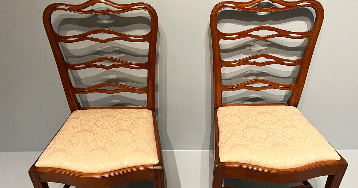 Two chairs with their newly-reupholstered seats